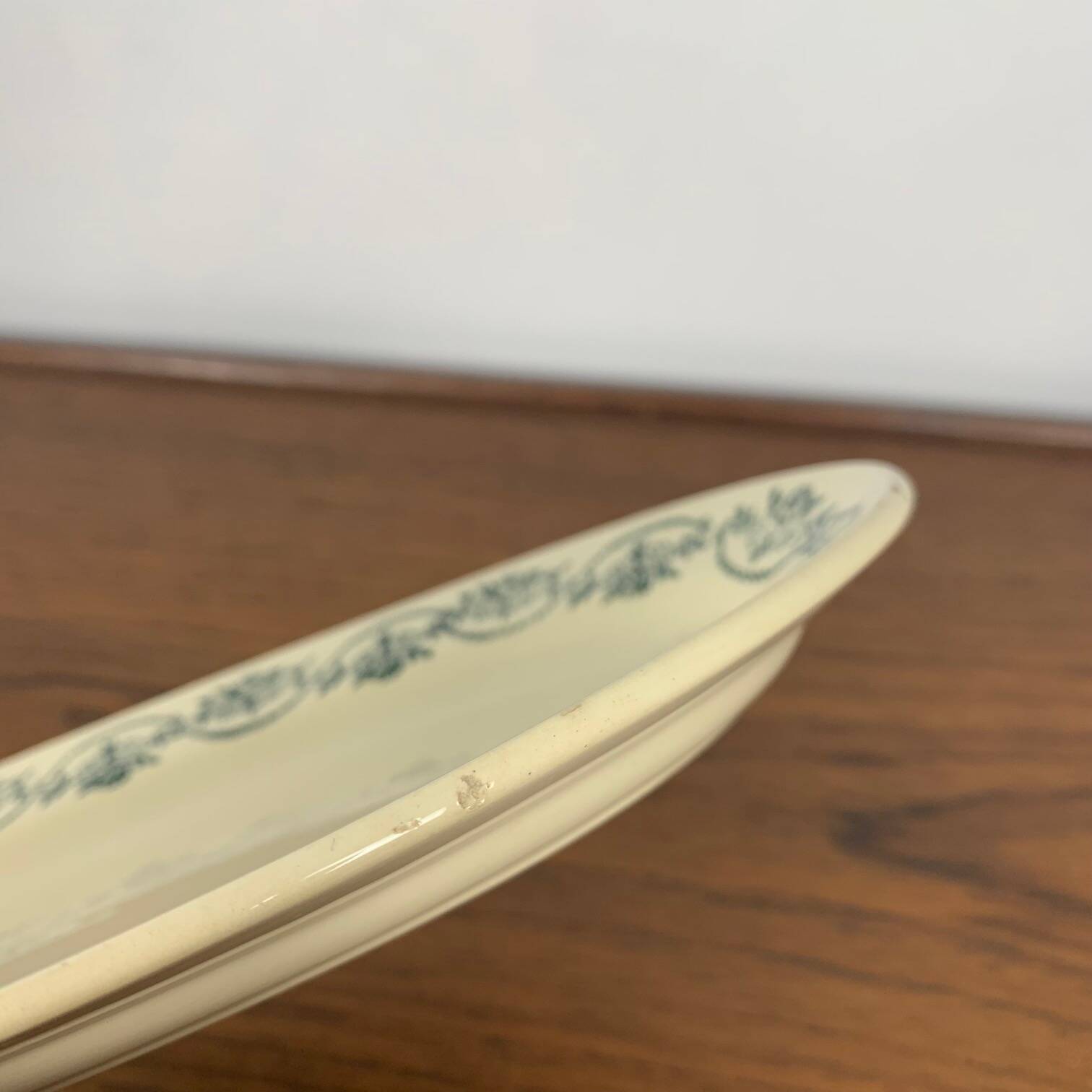 Small St Amand Ceranor dish, dark green flower pattern