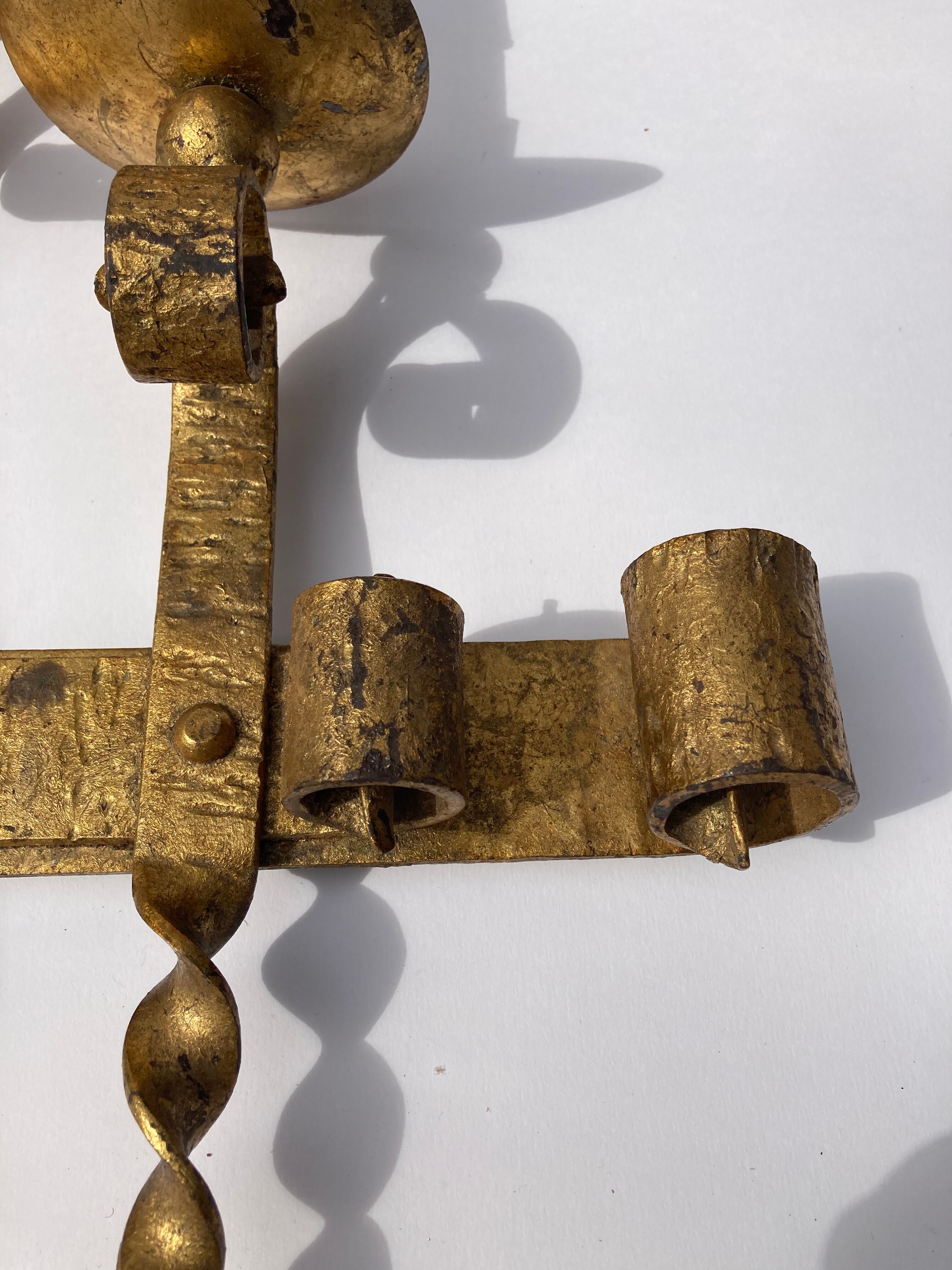 Wrought iron wall sconce brutalist