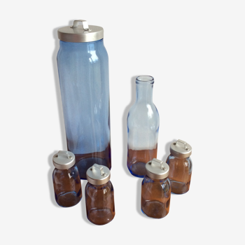 Set blue glass bottles tinted in the mass