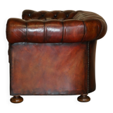 Pair of restored antique Chesterfield sofas in Boudreaux leather.