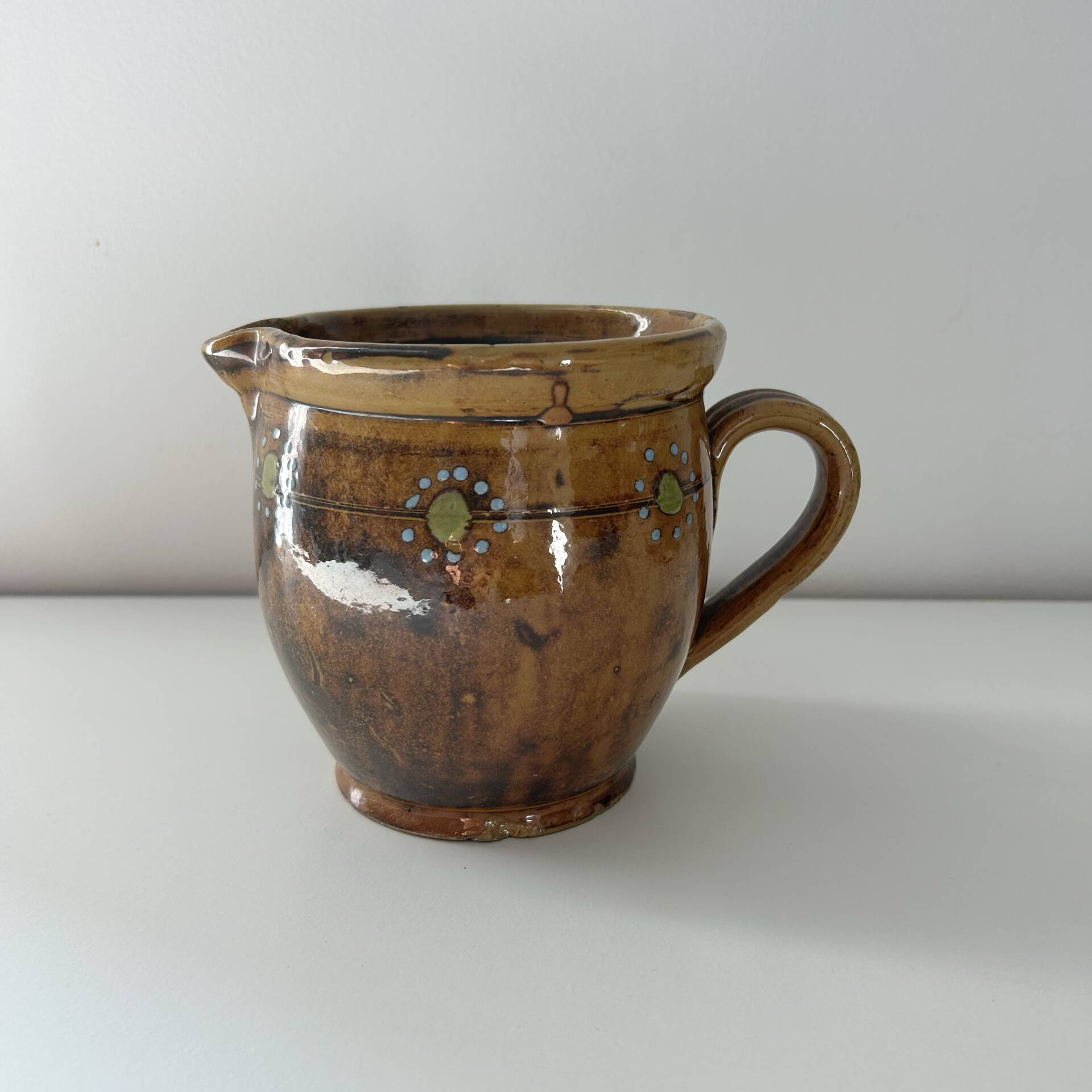 Provençal pitcher with floral decoration