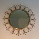 Sun mirror in brass and brushed steel