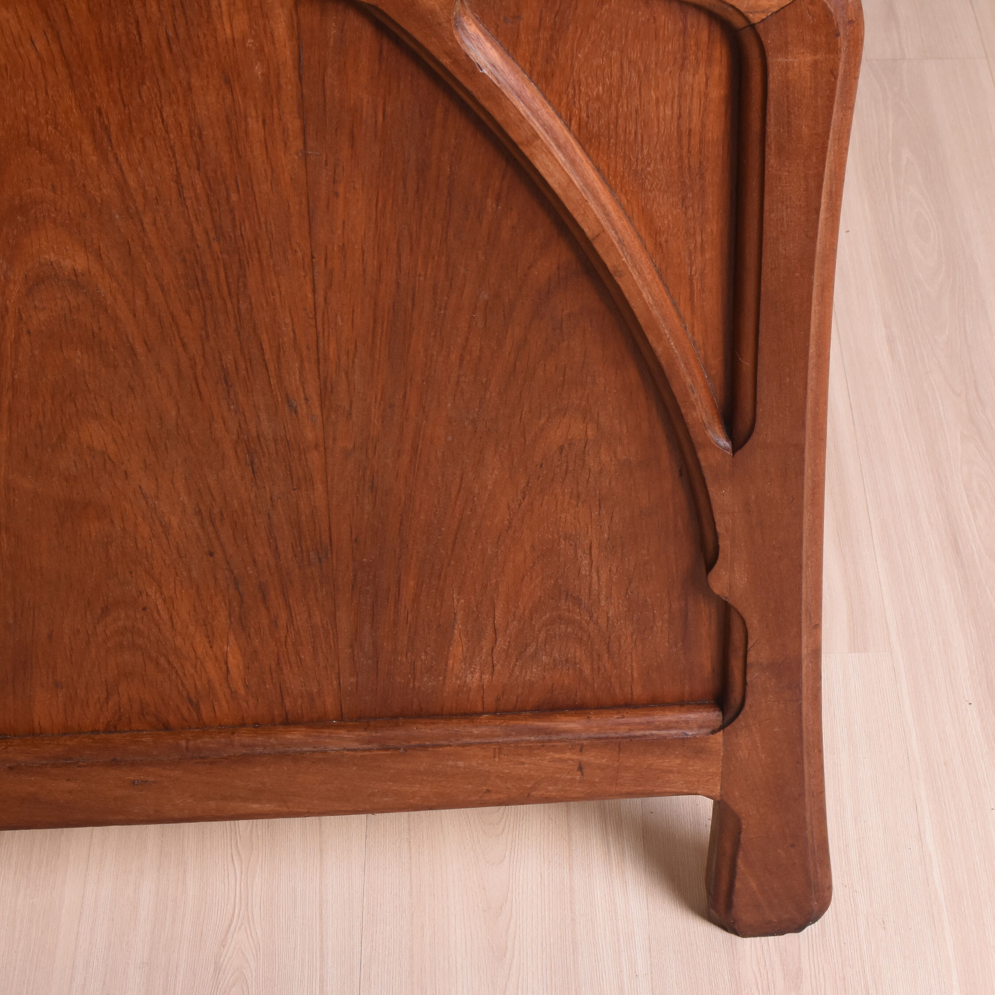 Wooden bed, early 20th century.