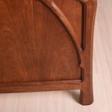 Wooden bed, early 20th century.