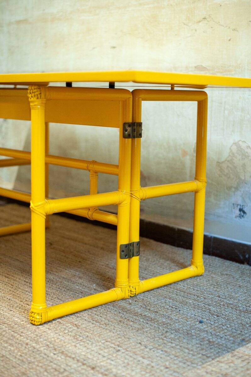 Yellow lacquered console with a flip-top surface by McGuire San Francisco, 1970s.