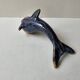 Signed blue ceramic dolphin sculpture (Signature to be identified)