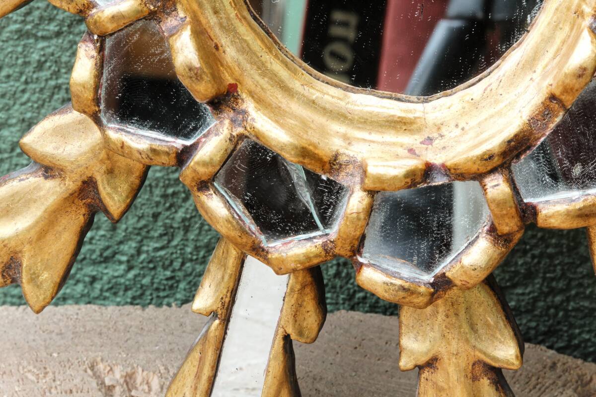 Sun mirror with parecloses, carved wood