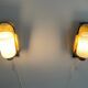 Mid-century pair of wall sconces in textured glass and brass, 1950s, Germany.