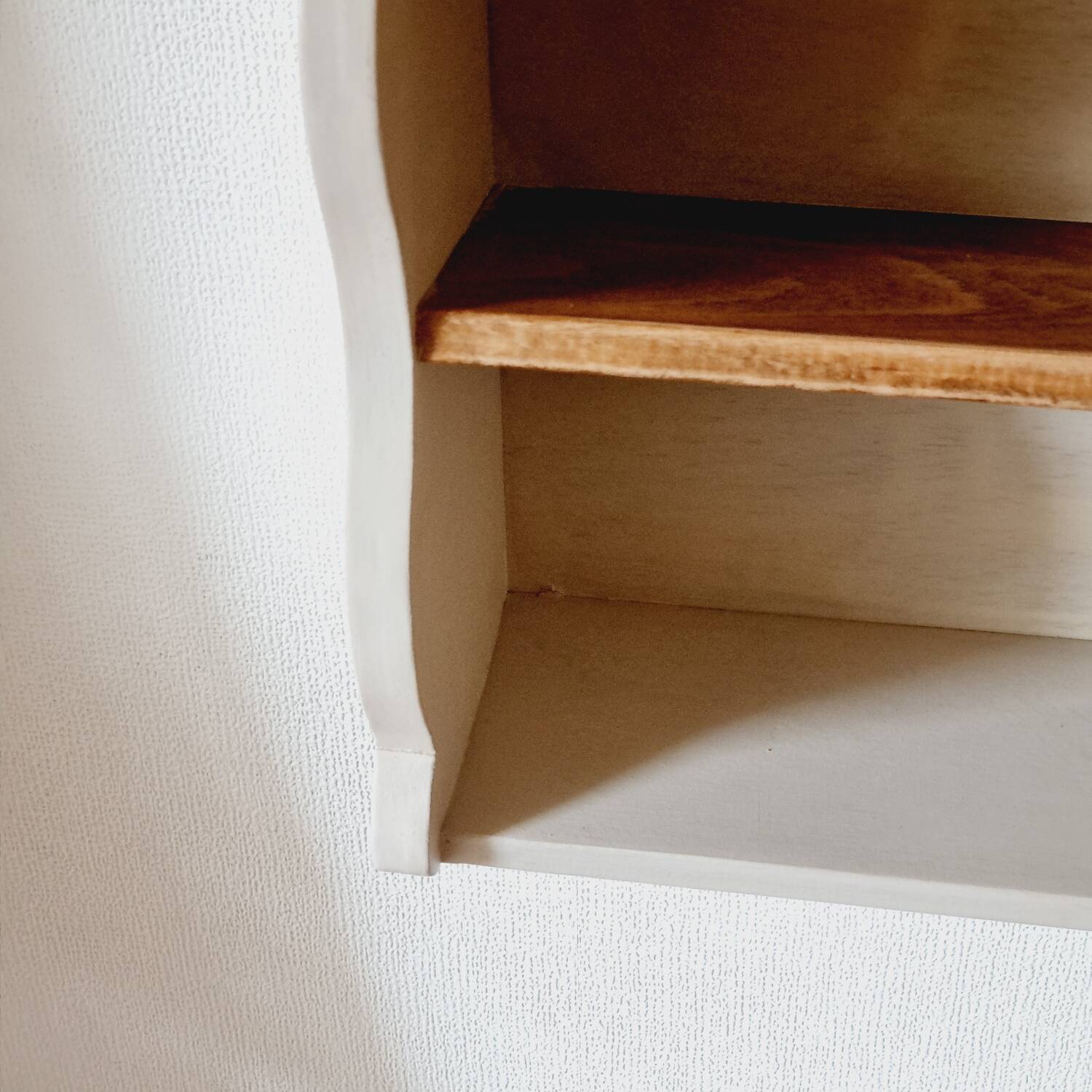 Linen-colored wooden shelf