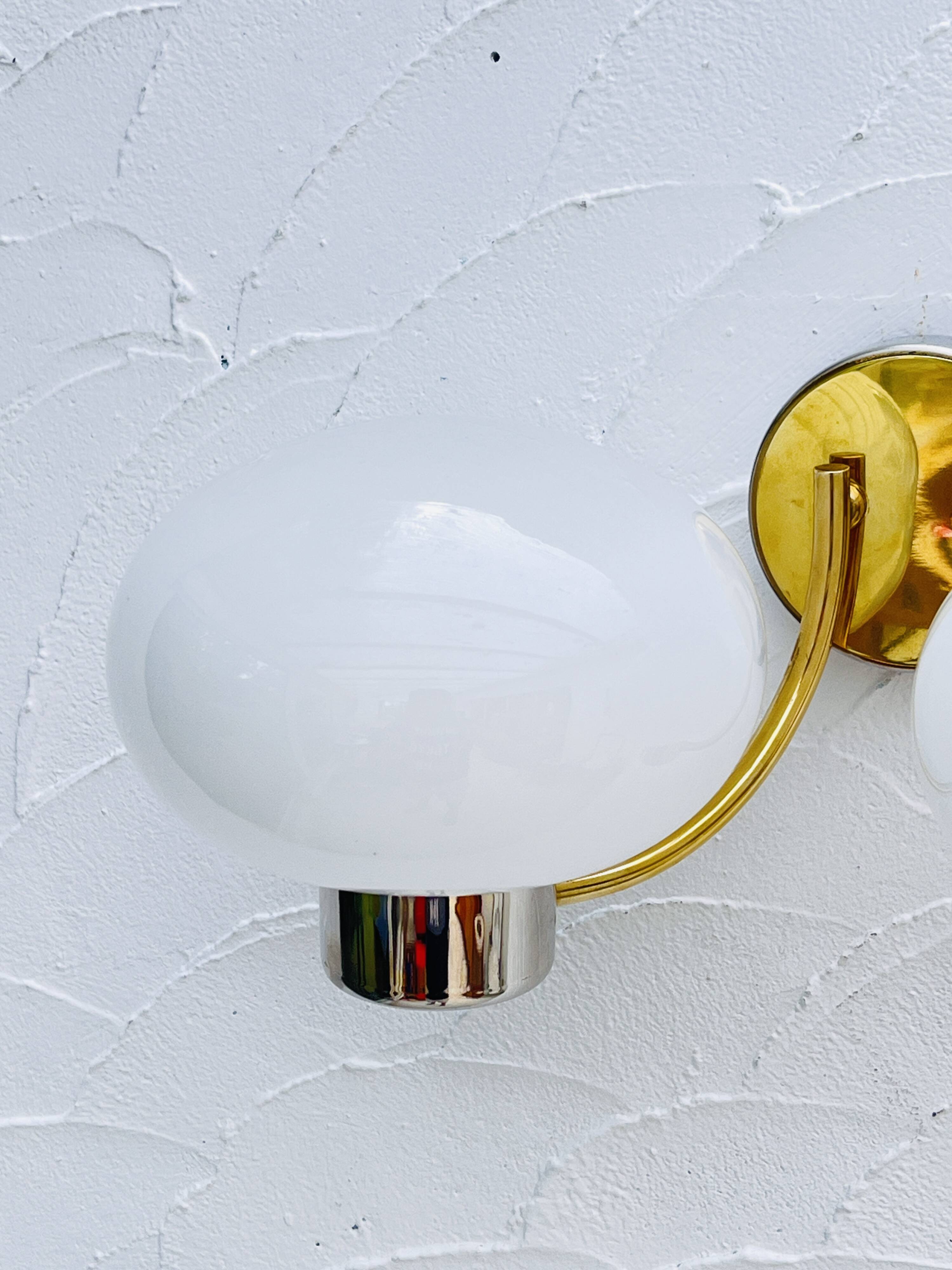 Double opaline brass wall light