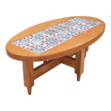 Oval coffee table by Guillerme and Chambron