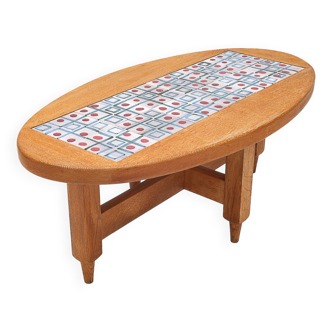 Oval coffee table by Guillerme and Chambron