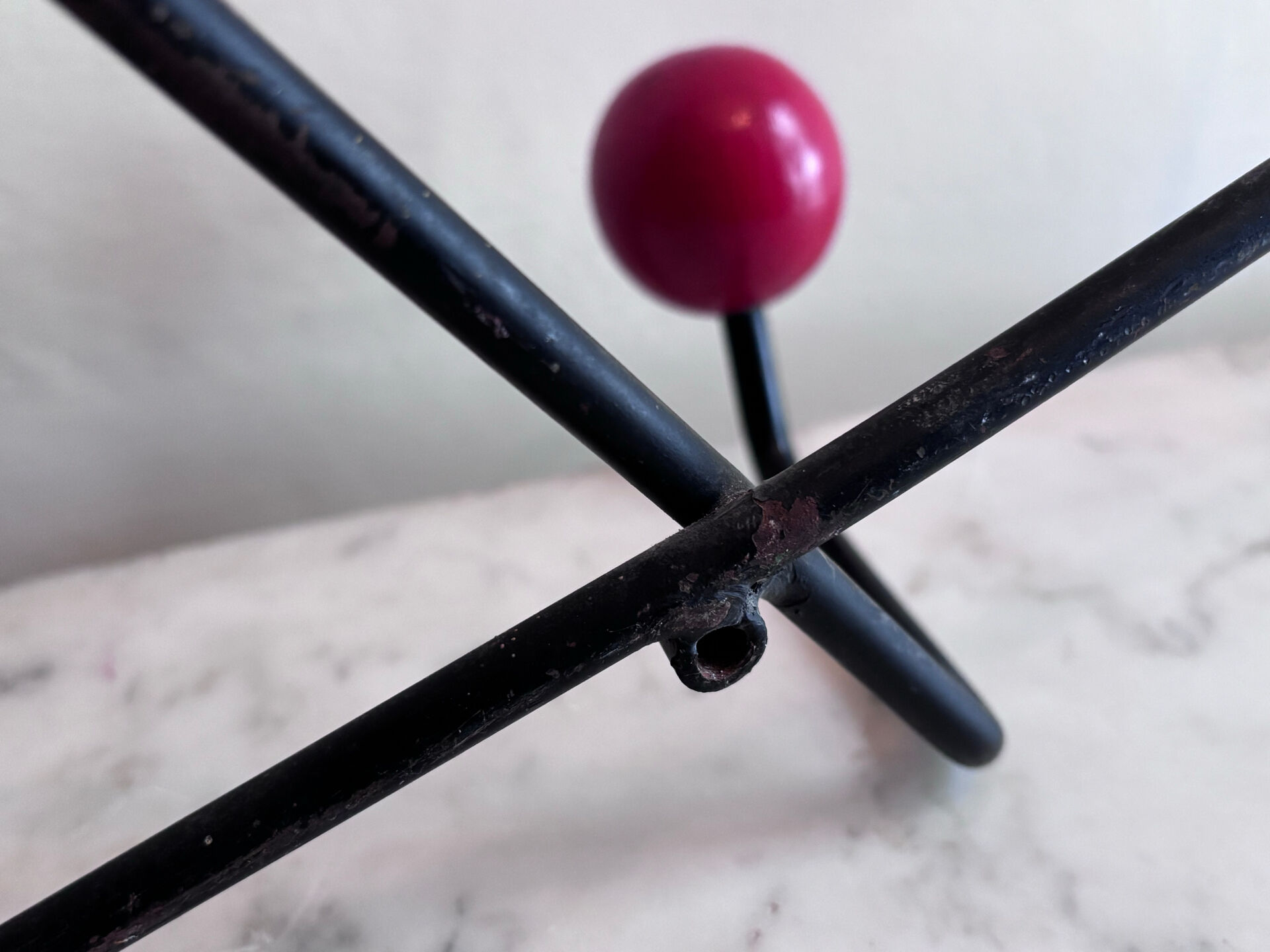 Wall coat rack Roger Feraud, metal and wooden balls.
