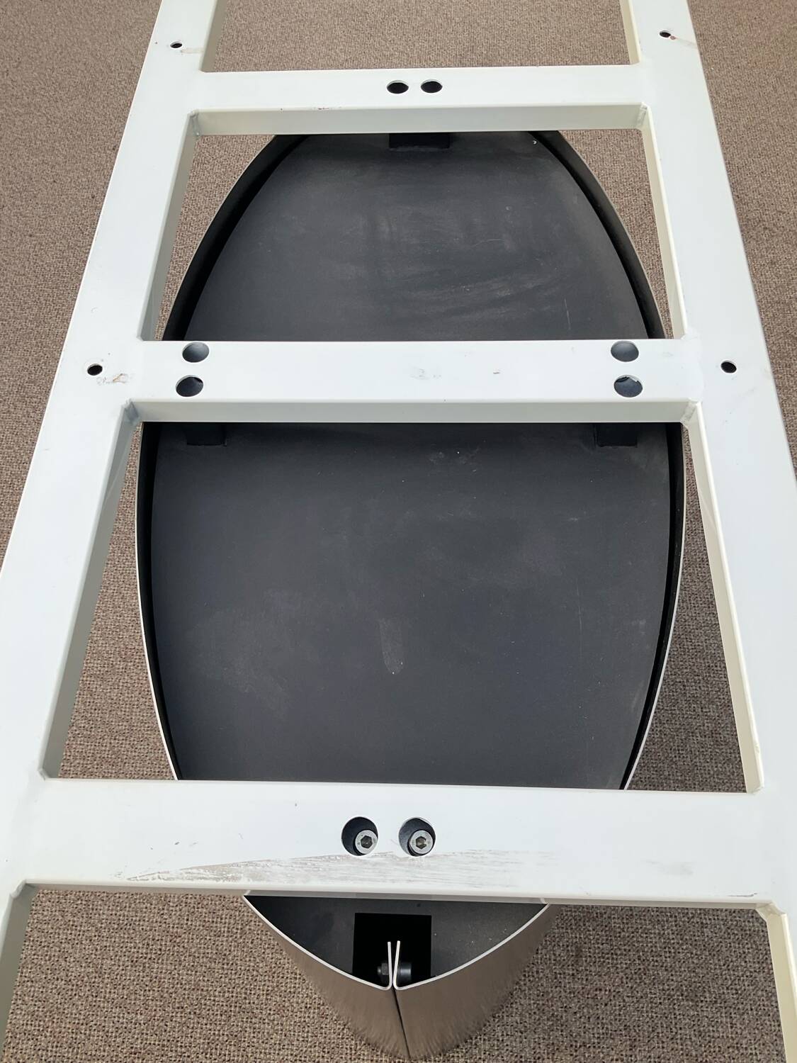 Oval designer dining table in frosted glass and brushed stainless steel