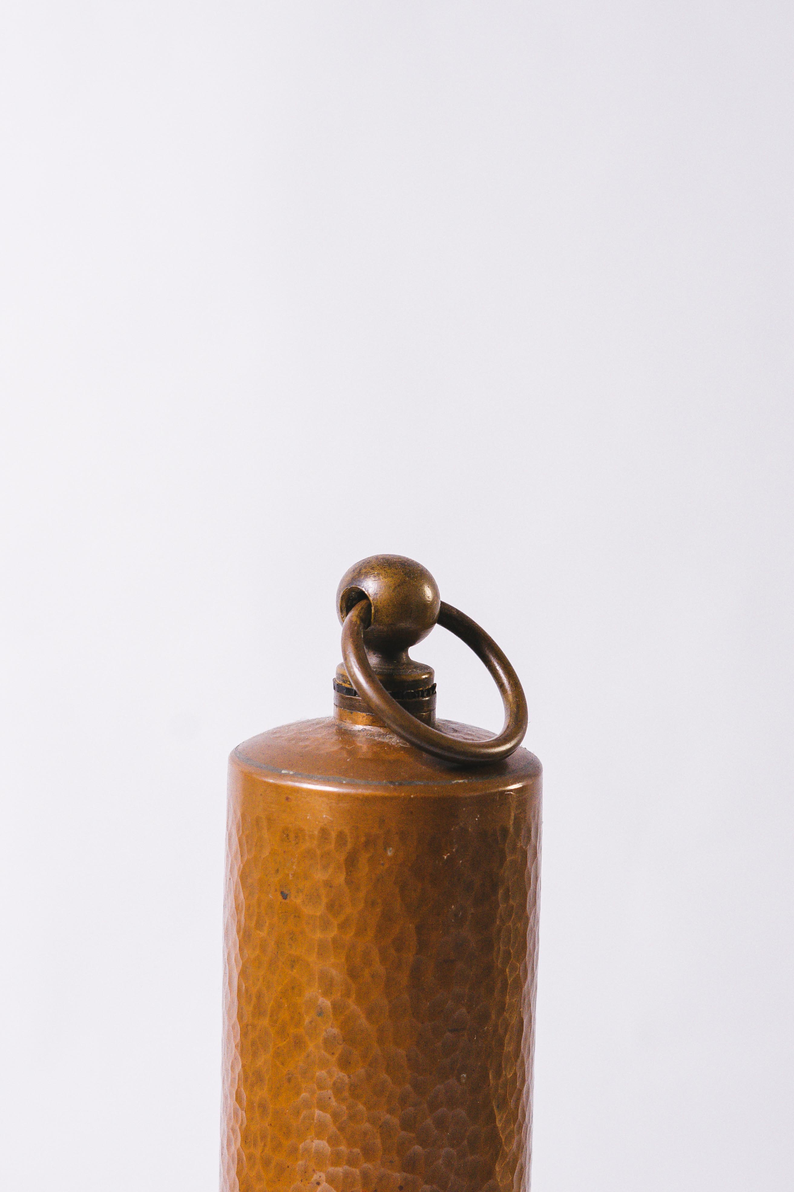 Old copper hot water bottle