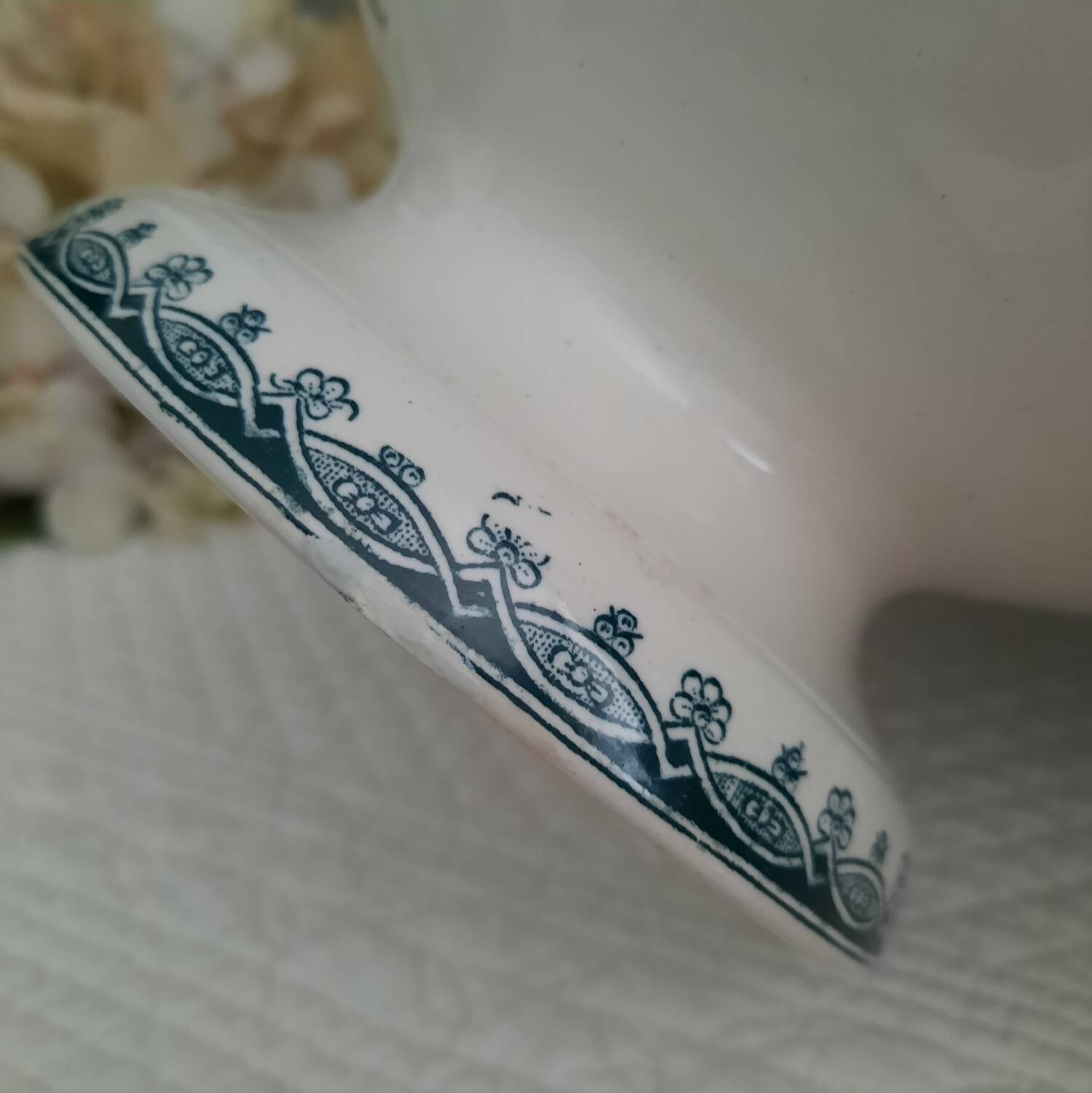 Old mismatched hollow plates in iron earth earthenware accompanied by a soup tureen