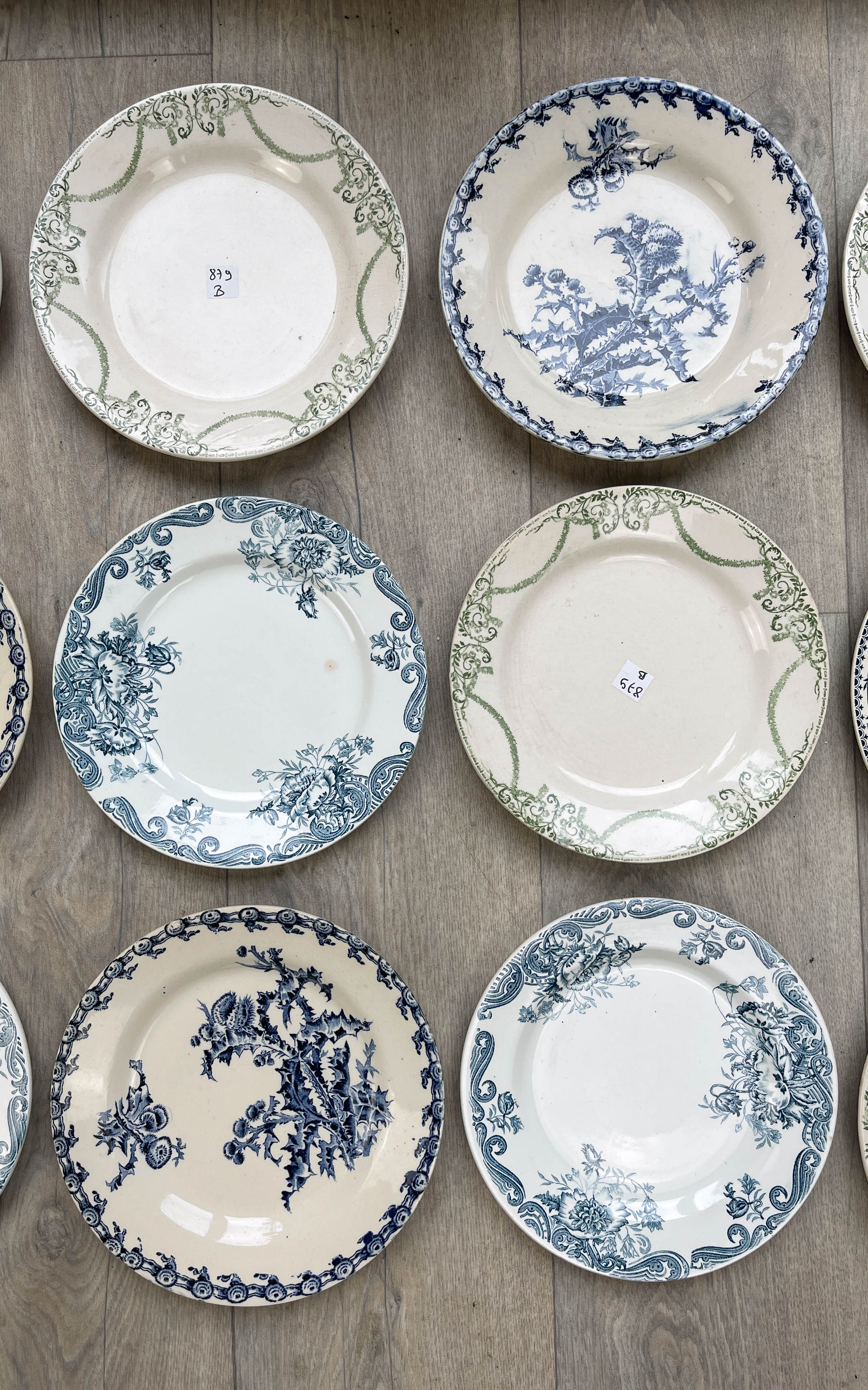6 green and blue mismatched iron earth plates
