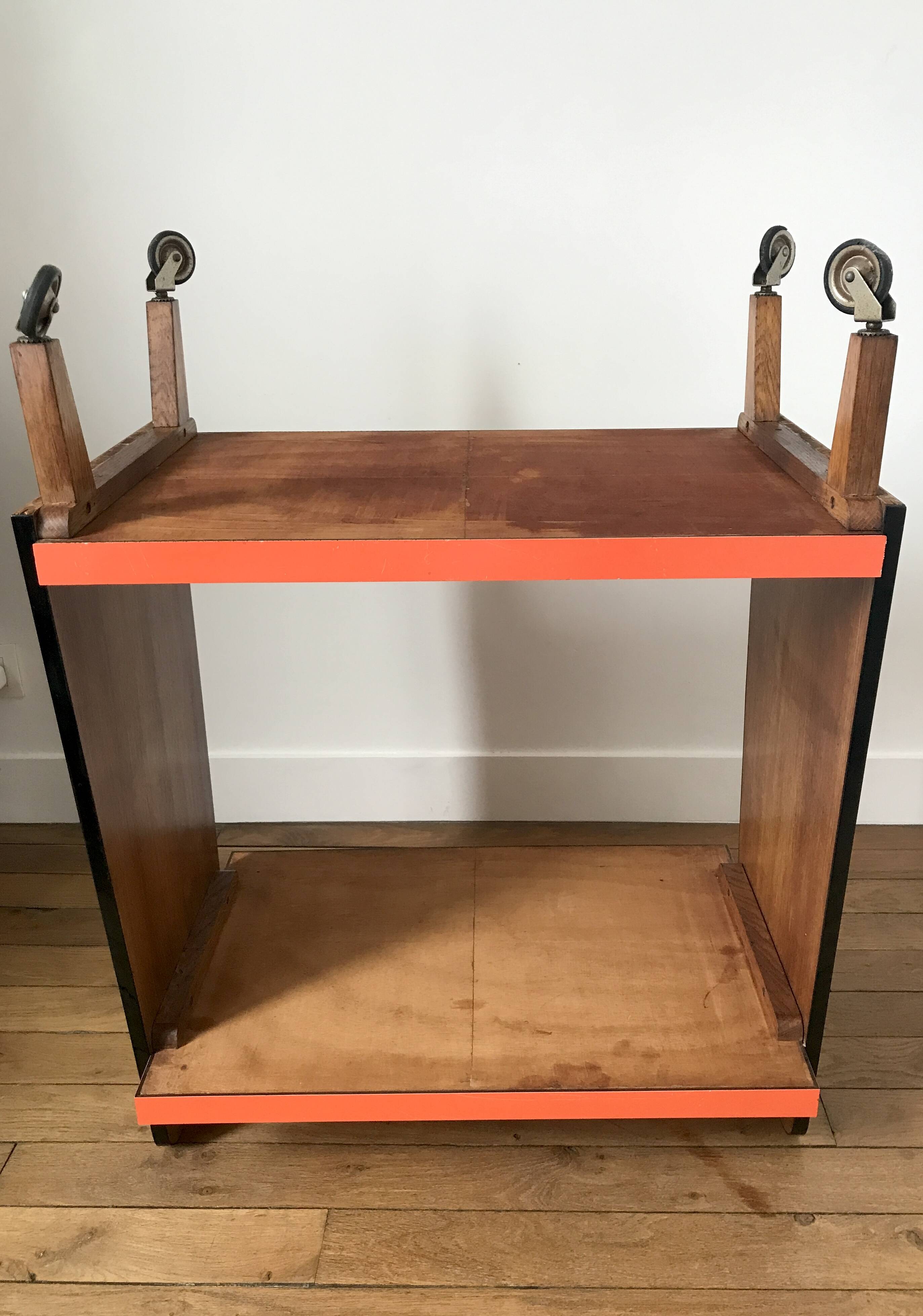 Desserte vintage orange, pieds en équerre et montants bois, années 60