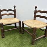 Pair of old low chairs in wood and straw