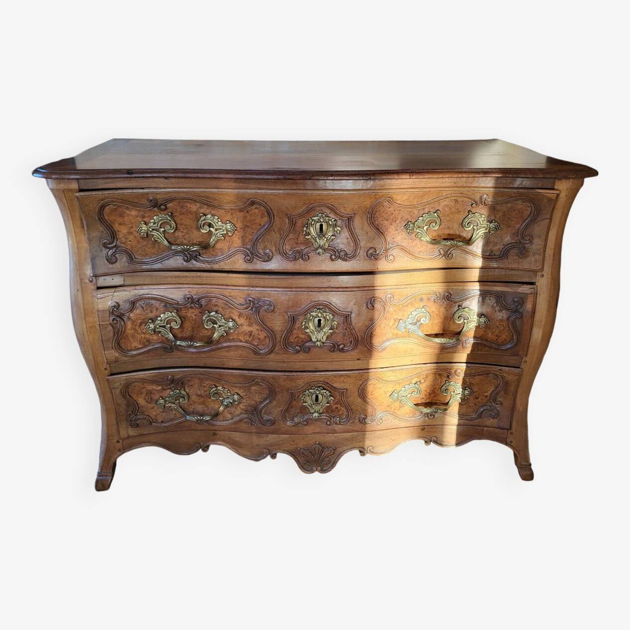 Provençal commode from the 18th century in Louis XV style made of solid walnut.