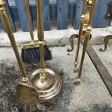Brass fireplace set and its two andirons