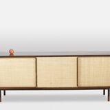 Sideboard in wenge, raffia and lacquered metal. 1970s.