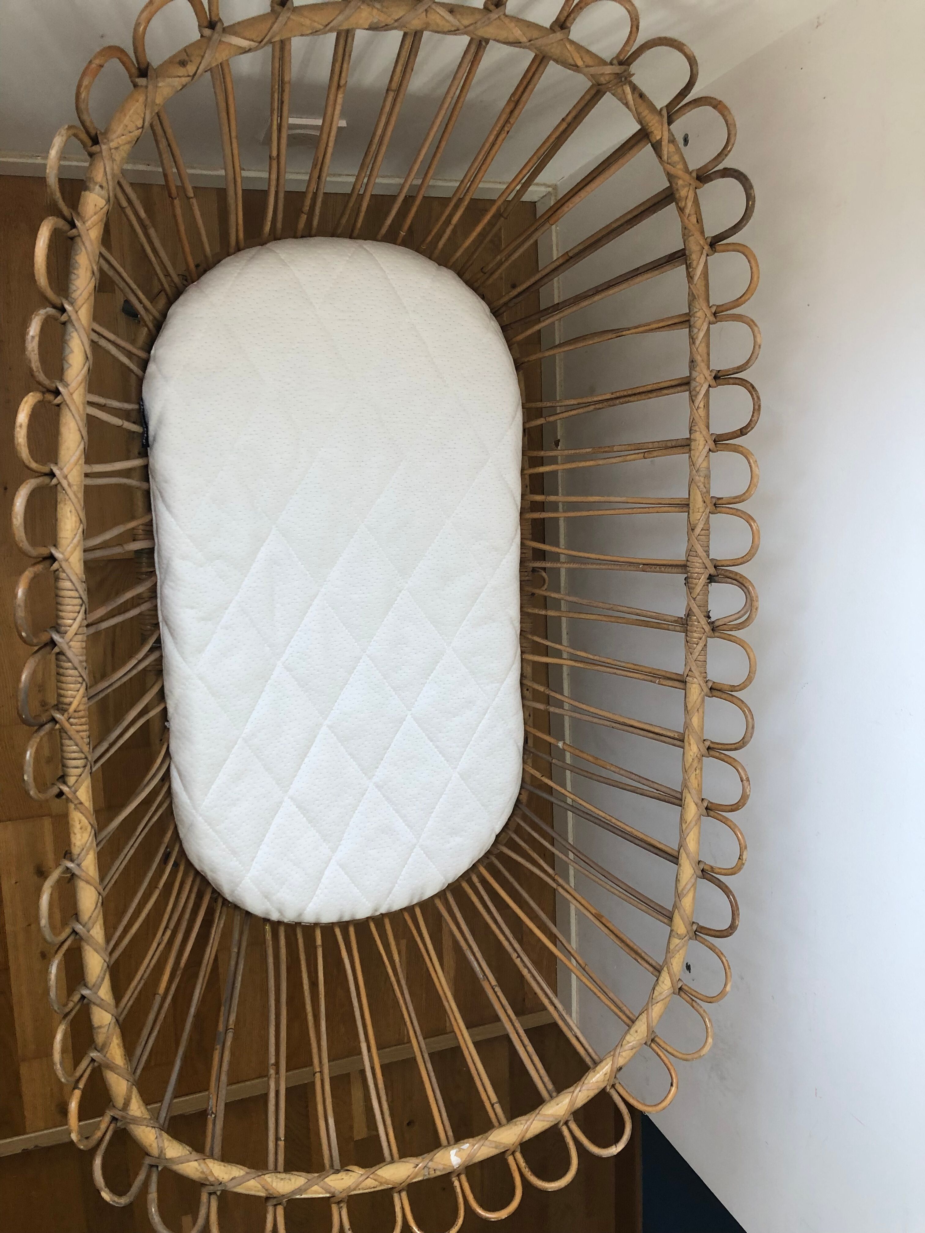 Vintage rattan cradle