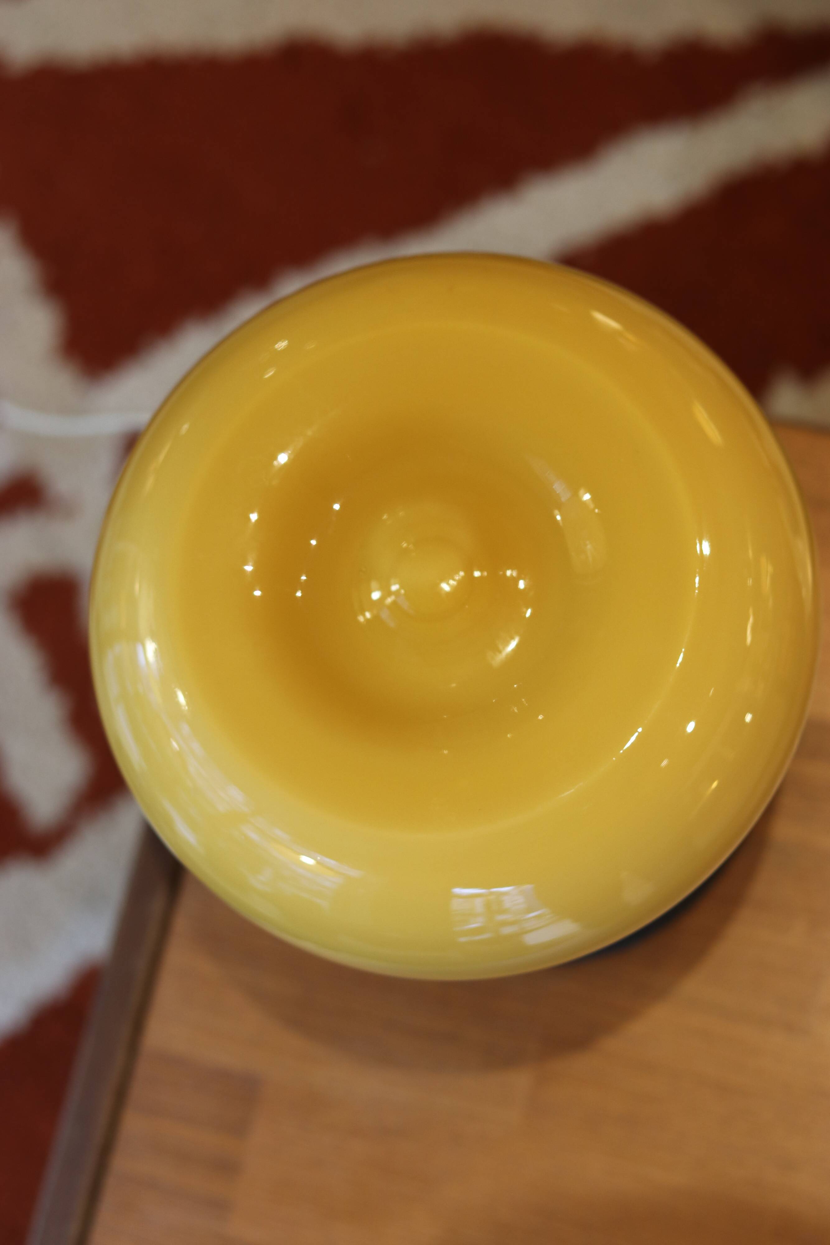 Mid-century vintage lamp — amber glass globe, 1960s