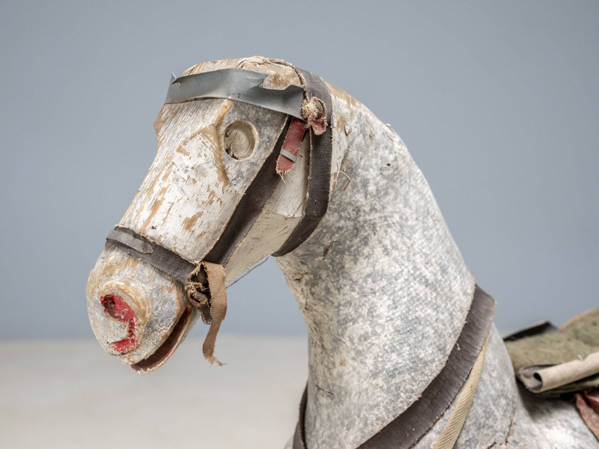 Antique wooden rocking horse, vintage toy with original patina.