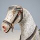 Antique wooden rocking horse, vintage toy with original patina.