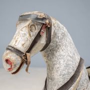 Antique wooden rocking horse, vintage toy with original patina.