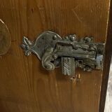 Ornamental piece of solid wood furniture, richly carved, dating from the 17th century.