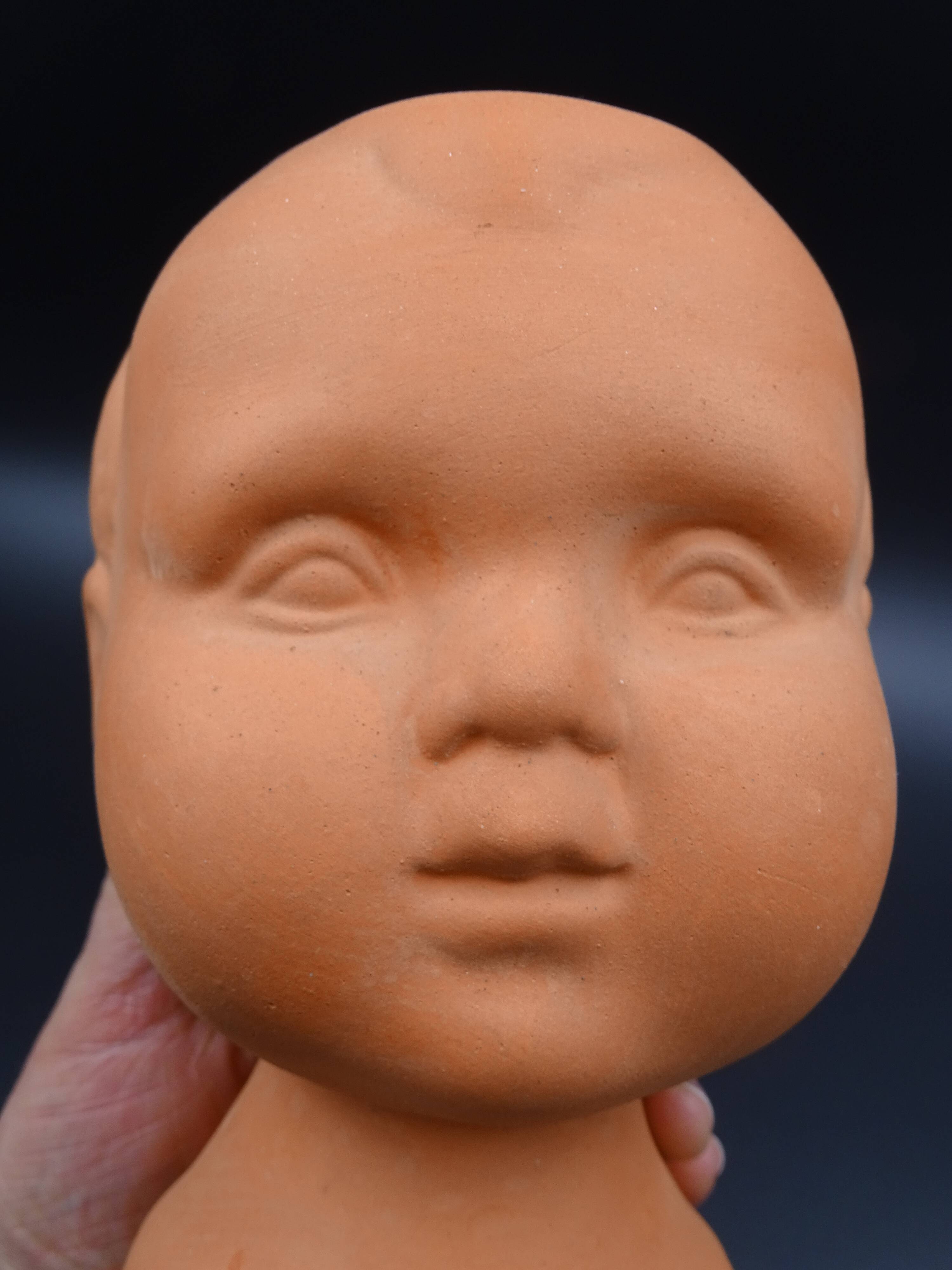 Vase in the shape of a baby's head - poupon