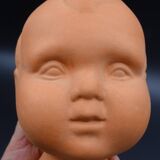 Vase in the shape of a baby's head - poupon