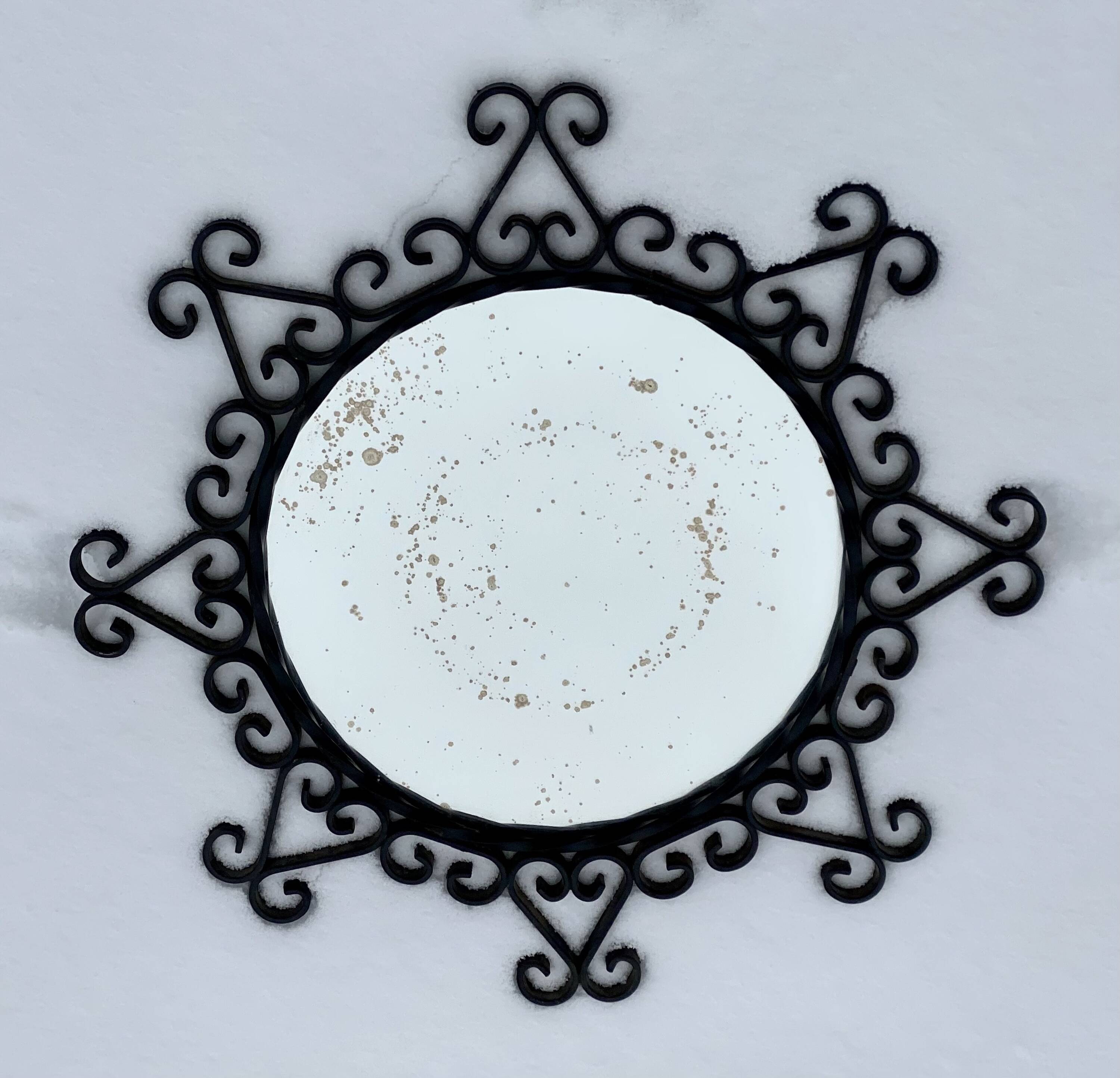 Vintage 1950s round metal mirror in the style of Chaty