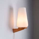 Wall lamp with opal glass shade on wooden base by Philips