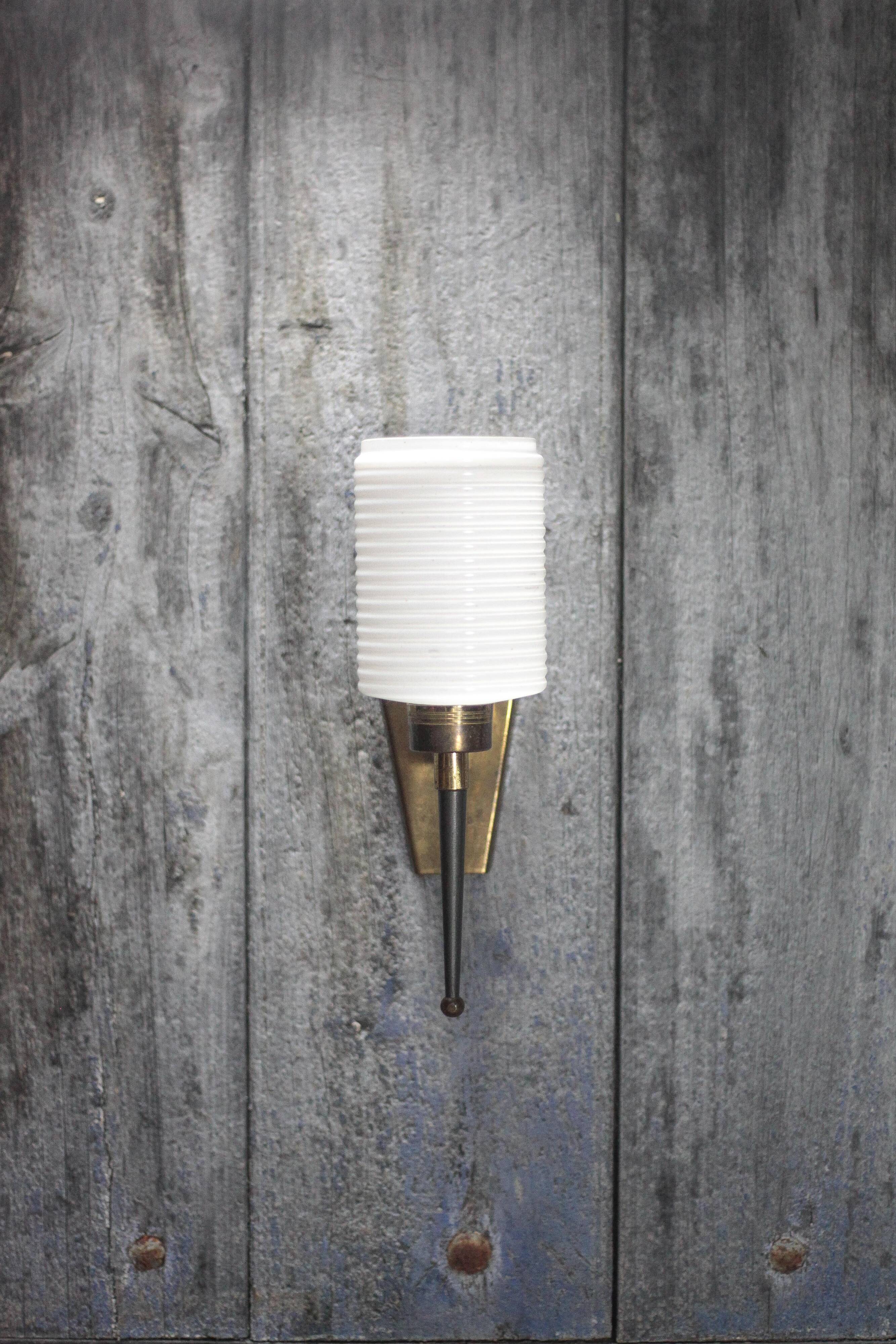 Brass wall light, black lacquered metal and white opal glass, 50s.