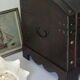 Wooden bulging treasure box