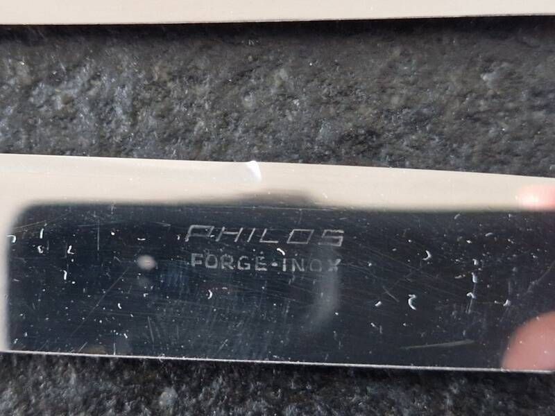 Philos - Set of 12 stainless steel dessert knives with bakelite handles.