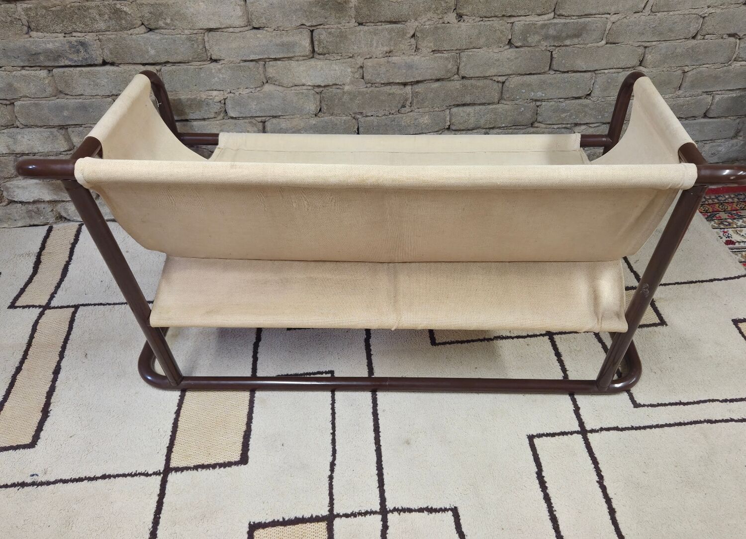 Tubular two-seater bench from the 1970s.