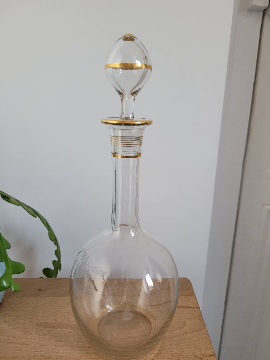 Glass carafe with gold trim