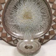 Wall-mounted candlestick in grayish colors, Danish and from the 1970s-80s.