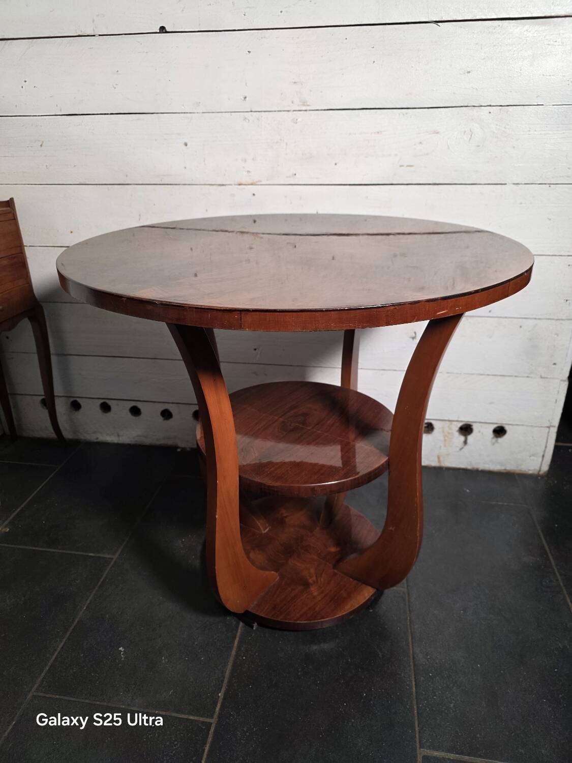 Art Deco walnut gueridon with double top from the 1930s.