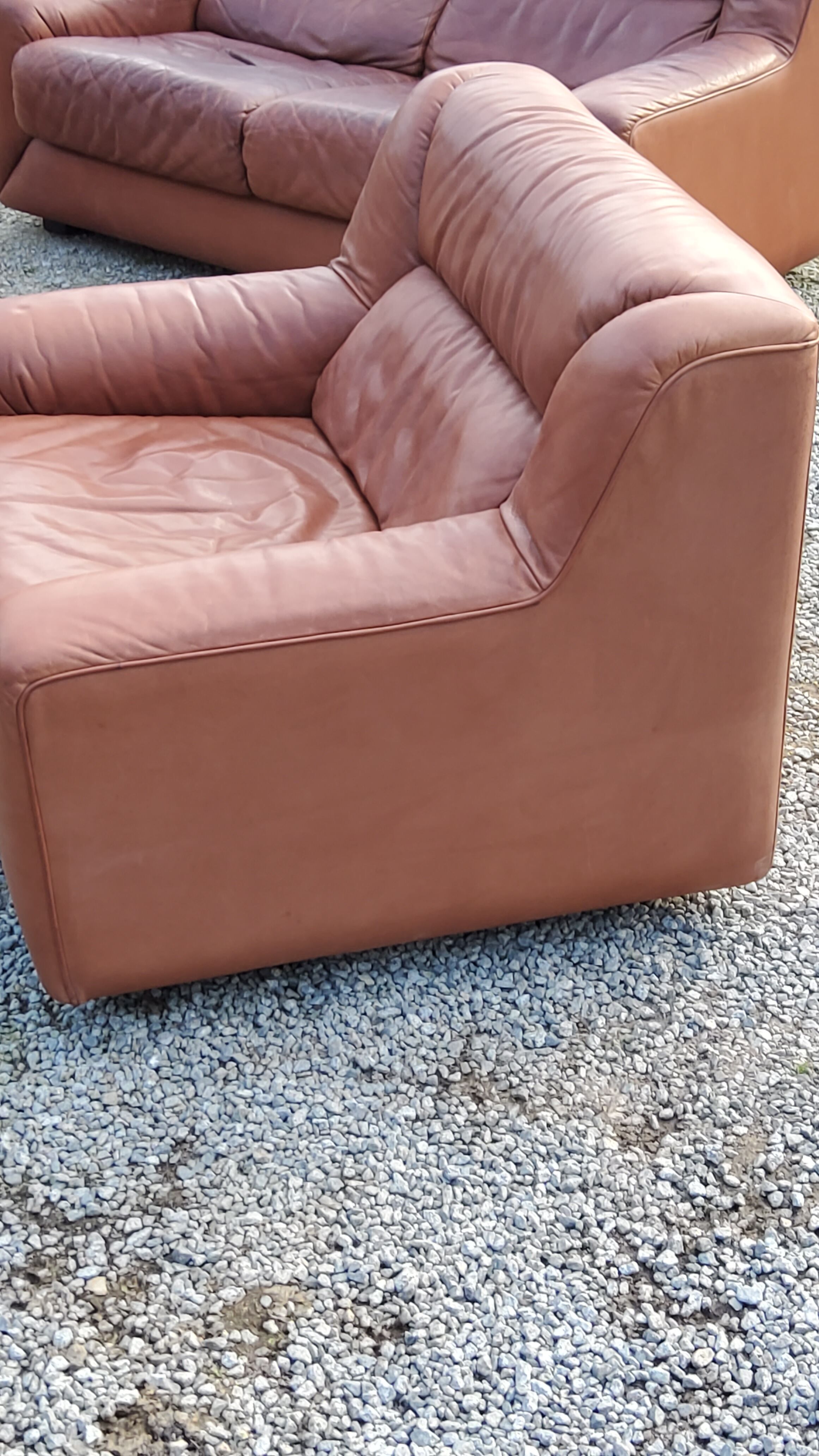 Pair of armchairs and De Sede sofa in cognac leather from the 70s/80s