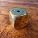 Pen holder, die-shaped brass paperweight
