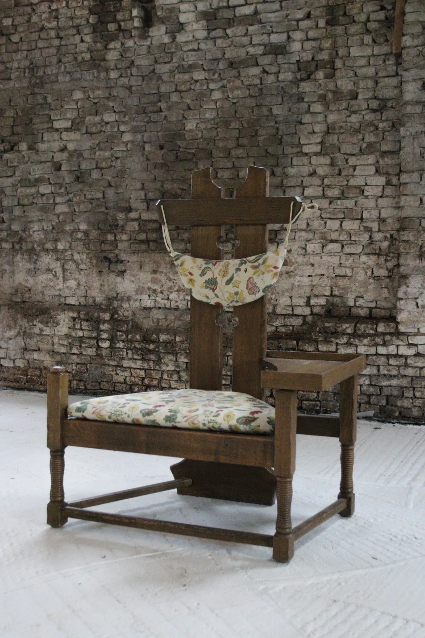 Rare Dutch brutalist oak armchair with integrated side table – 1950s
