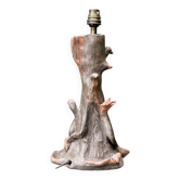 Pied de lampe en terre cuite sculptée d'oiseaux, signé