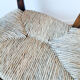Vintage children's armchair in wood and straw, 50s