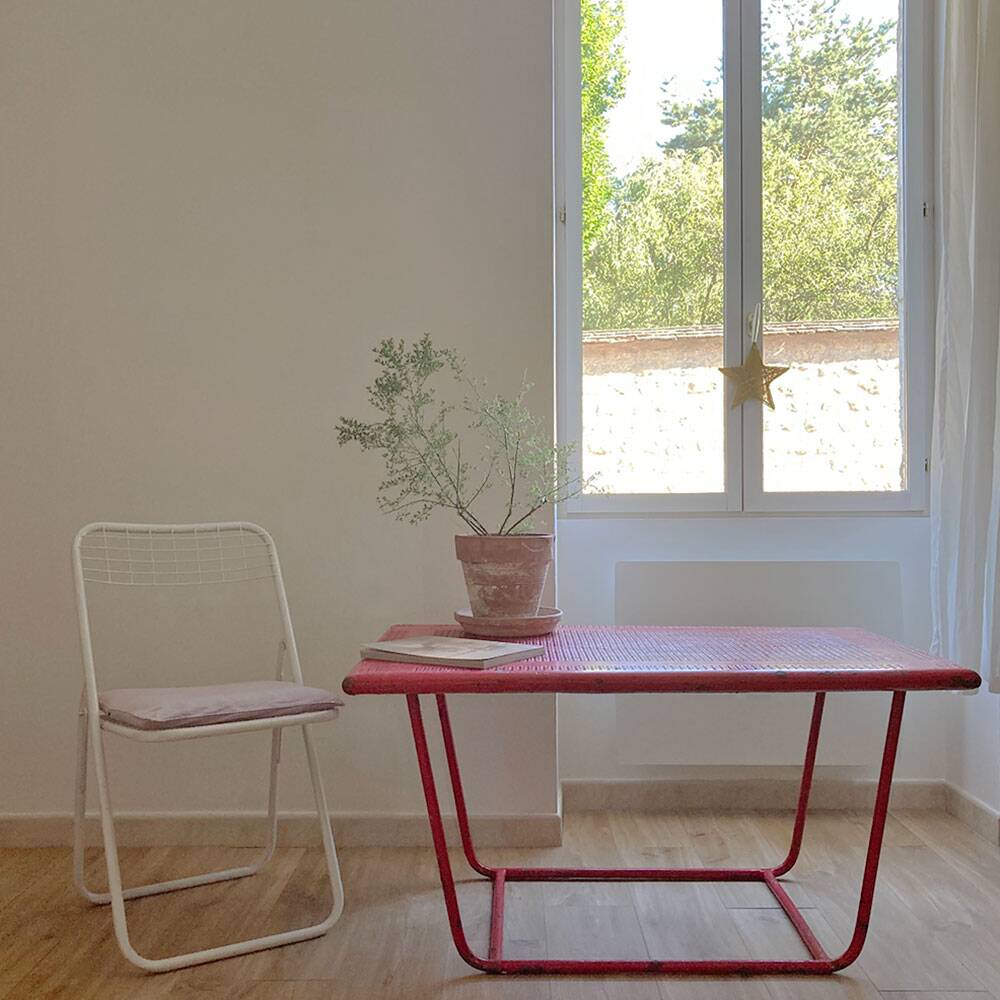 Perforated metal coffee table from the 1950s