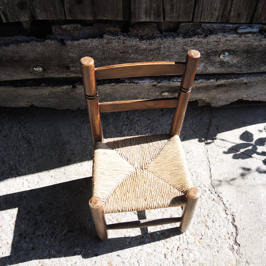 Old children's straw chair